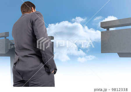 Composite image of thinking businessman 9812338