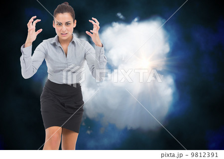Composite image of furious businesswoman gesturing 9812391