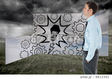 Composite image of happy businessman standing with hand in pocke 9813302