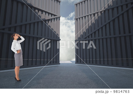Composite image of focused businesswoman 9814763