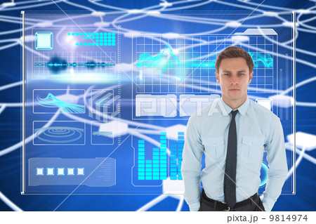 Composite image of serious businessman with hands in pockets 9814974