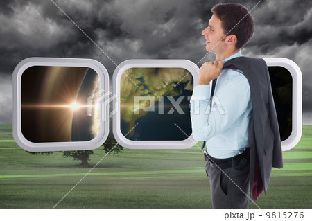 Composite image of smiling businessman holding his jacket Composite image of smiling businessman holding his jacket 9815276