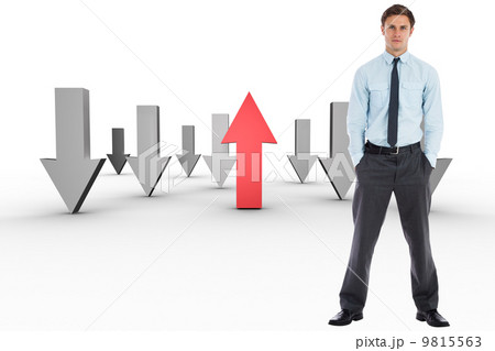 Composite image of serious businessman standing with hands in po Composite image of serious businessman standing with hands in po 9815563