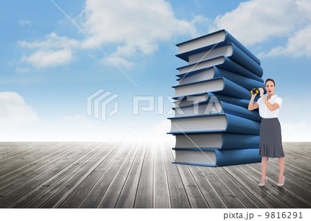 Composite image of astonished elegant businesswoman holding bino 9816291