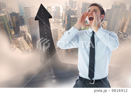 Composite image of businessman shouting 9816912
