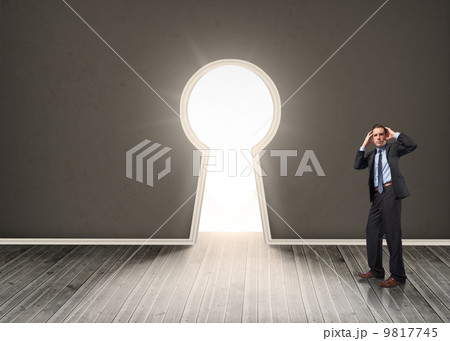 Composite image of stressed businessman with hands on head Composite image of stressed businessman with hands on head 9817745