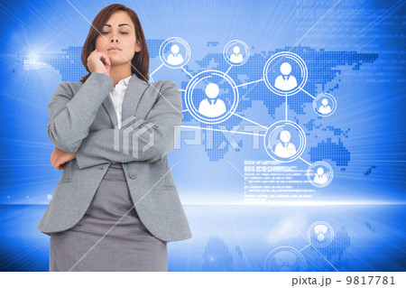 Composite image of focused businesswoman Composite image of focused businesswoman 9817781