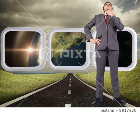 Composite image of thinking businessman touching chin Composite image of thinking businessman touching chin 9817820