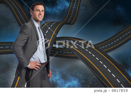 Composite image of smiling businessman with hand on hip Composite image of smiling businessman with hand on hip 9817859