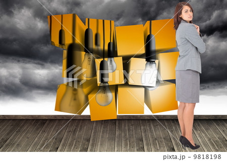 Composite image of focused businesswoman Composite image of focused businesswoman 9818198