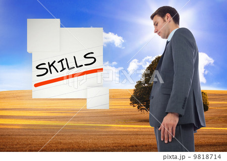 Composite image of stern businessman standing Composite image of stern businessman standing 9818714