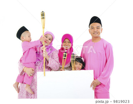 asian malay family during raya with blank cardboard 9819023