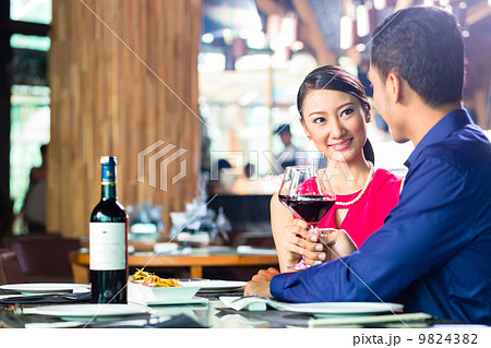 Asian couple fine dining in restaurant 9824382