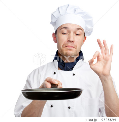 chef holding pan 9826894