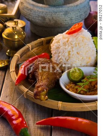 nasi ayam penyet, indonesian fried chicken rice nasi ayam penyet, indonesian fried chicken rice 9827052