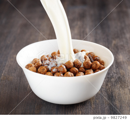 Bowl of chocolate cereal on a table Bowl of chocolate cereal on a table 9827249