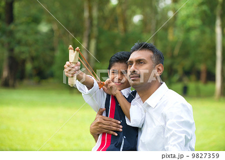 indian father and son fatherhood session with a sling shot indian father and son fatherhood session with a sling shot 9827359