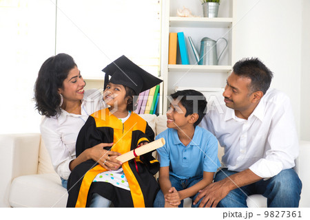 Happy indian family graduation, education concept photo 9827361