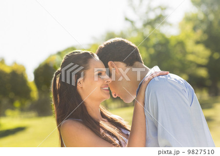 Loving and happy couple at park 9827510