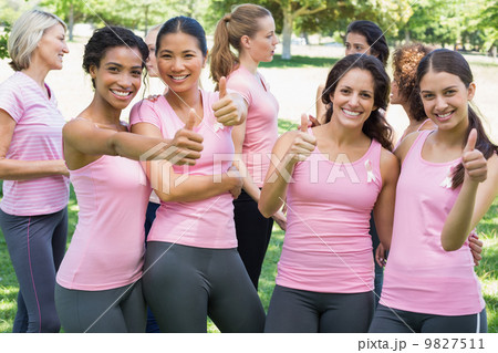 Breast cancer participants gesturing thumbs up 9827511