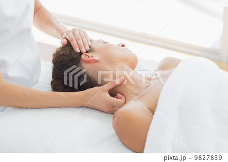 Woman receiving neck massage in spa Woman receiving neck massage in spa 9827839