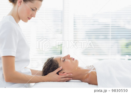 Beautiful woman receiving massage Beautiful woman receiving massage 9830550