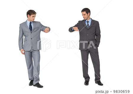 Business partners leaning on copy space looking down 9830659