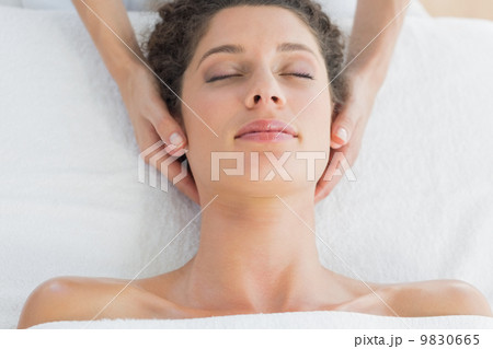 Woman receiving massage in health spa Woman receiving massage in health spa 9830665