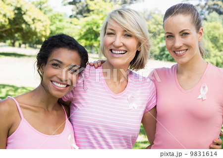 Multiethnic volunteers participating in breast cancer awareness 9831614