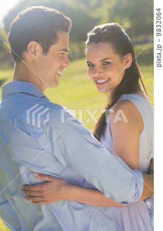 Portrait of a loving and happy couple at park 9832064