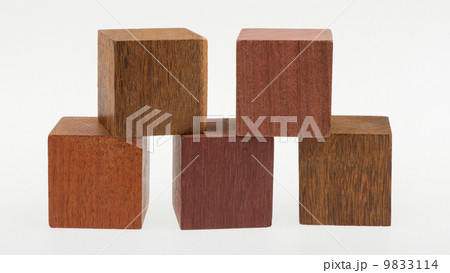 Several old cubes of wood, used by children for building 9833114