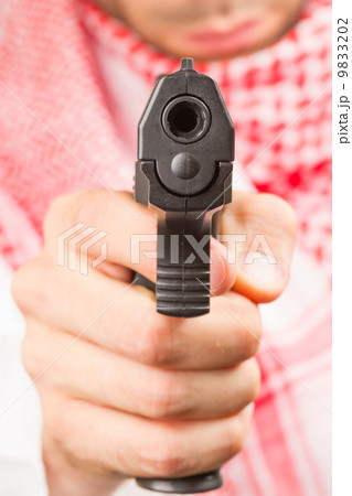 Arab adult with a machine gun, terrorist Arab adult with a machine gun, terrorist 9833202