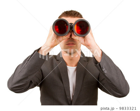 Portrait of a young male entrepreneur looking for business oppor Portrait of a young male entrepreneur looking for business oppor 9833321
