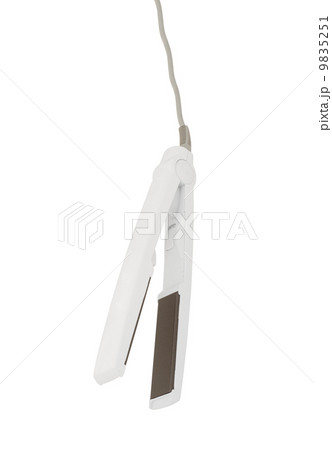 electric iron for hair isolated on white electric iron for hair isolated on white 9835251