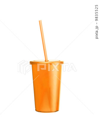 Orange plastic glass with tubule on a white background 9835525