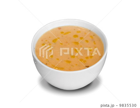 Plate of soup on white background 9835530