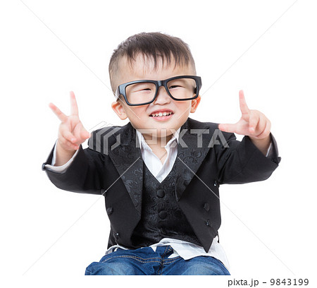 Baby boy smile with victory hand gesture 9843199