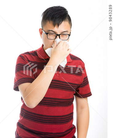 Asian man sneezing 9843289