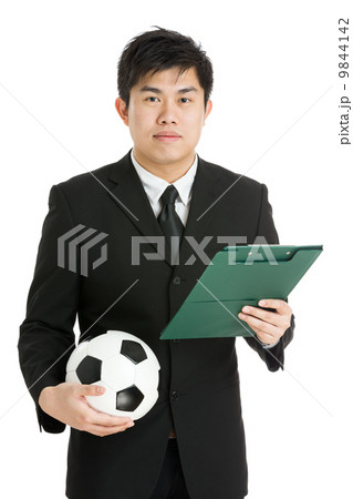 Football manager with soccer ball and tactcial board Football manager with soccer ball and tactcial board 9844142