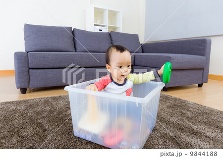 Asian baby boy playing at living room 9844188
