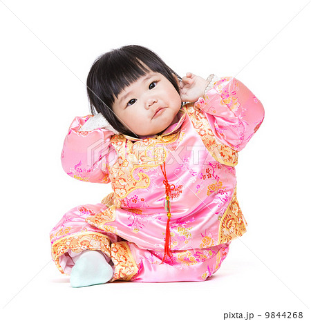 Baby have funny posture with traditional china costume 9844268