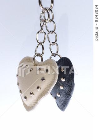 black and white heart fixed by chain. black and white heart fixed by chain. 9848084