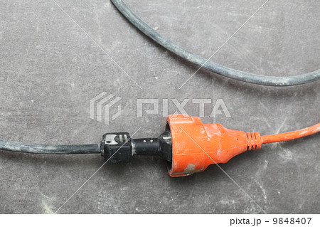 electrical plug in the electric extension cord electrical plug in the electric extension cord 9848407