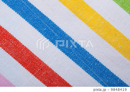 Closeup of colorful striped textile as background or texture 9848419