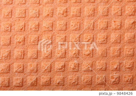 Orange sponge foam as background texture Orange sponge foam as background texture 9848426
