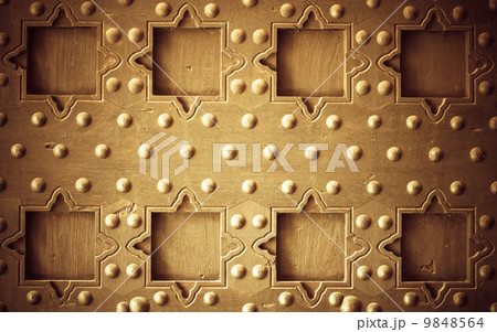 Old wooden background with metal rivets vintage door detail 9848564