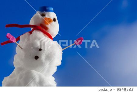 Little happy christmas snowman with pink gloves outdoor. Winter season. Little happy christmas snowman with pink gloves outdoor. Winter season. 9849532