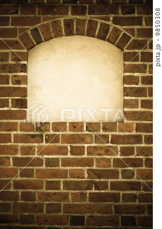 Old arch arc niche with copy space in brick wall background Old arch arc niche with copy space in brick wall background 9850308