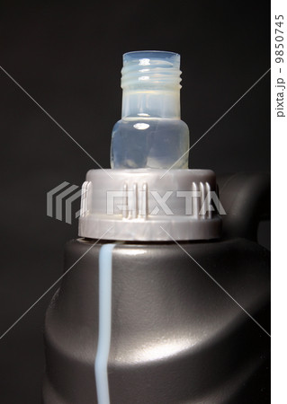 Can with car engine oil black background 9850745