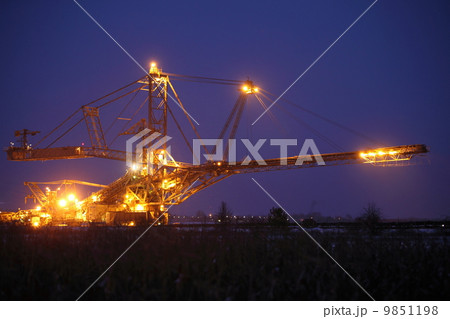giant excavator in a coal open pit evening 9851198